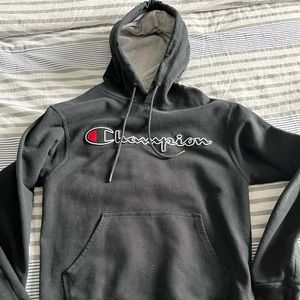 Champion hoodie with logo on the front. Size small